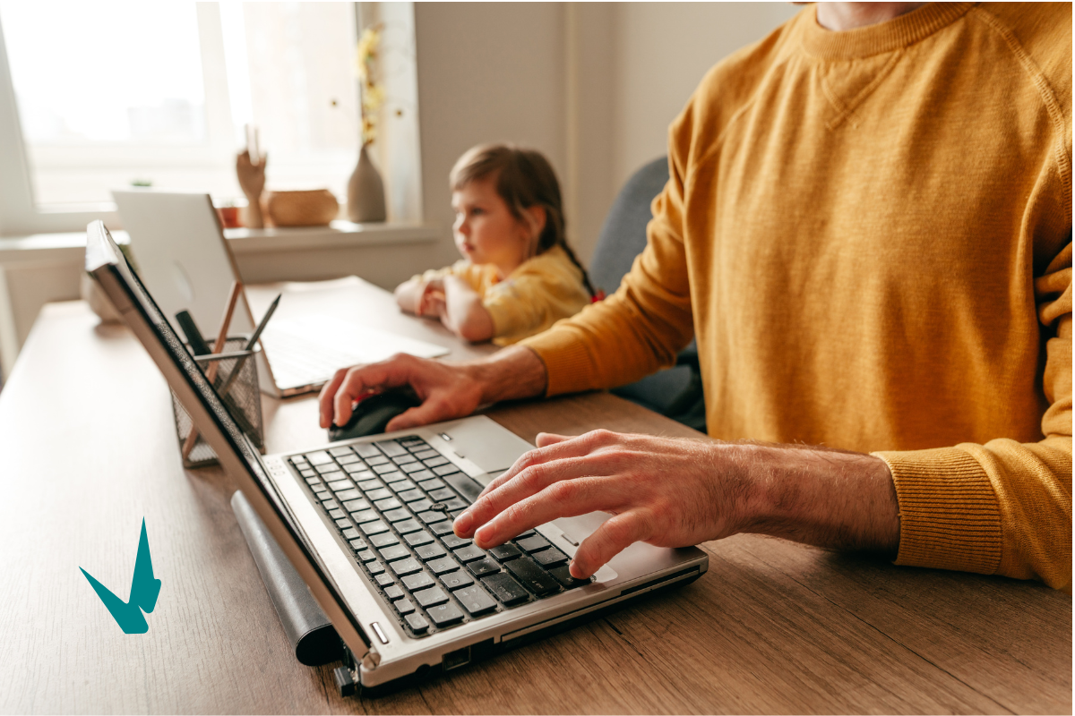 A picture of a remote worker with his daughter by his side.